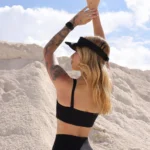 Top fitness feminino Zoe em tecido Moove preto - vista das costas