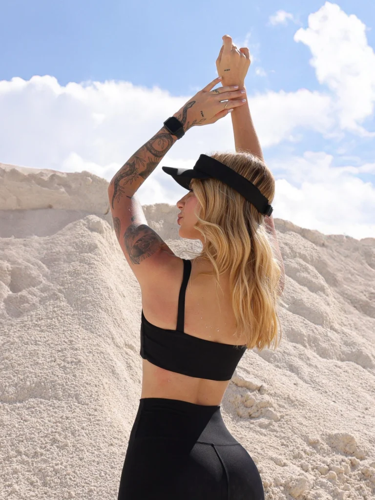 Top fitness feminino Zoe em tecido Moove preto - vista das costas